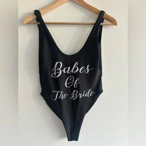 Prettylittlething, size M/L, body suit, “babes of the bride” graphic, low back